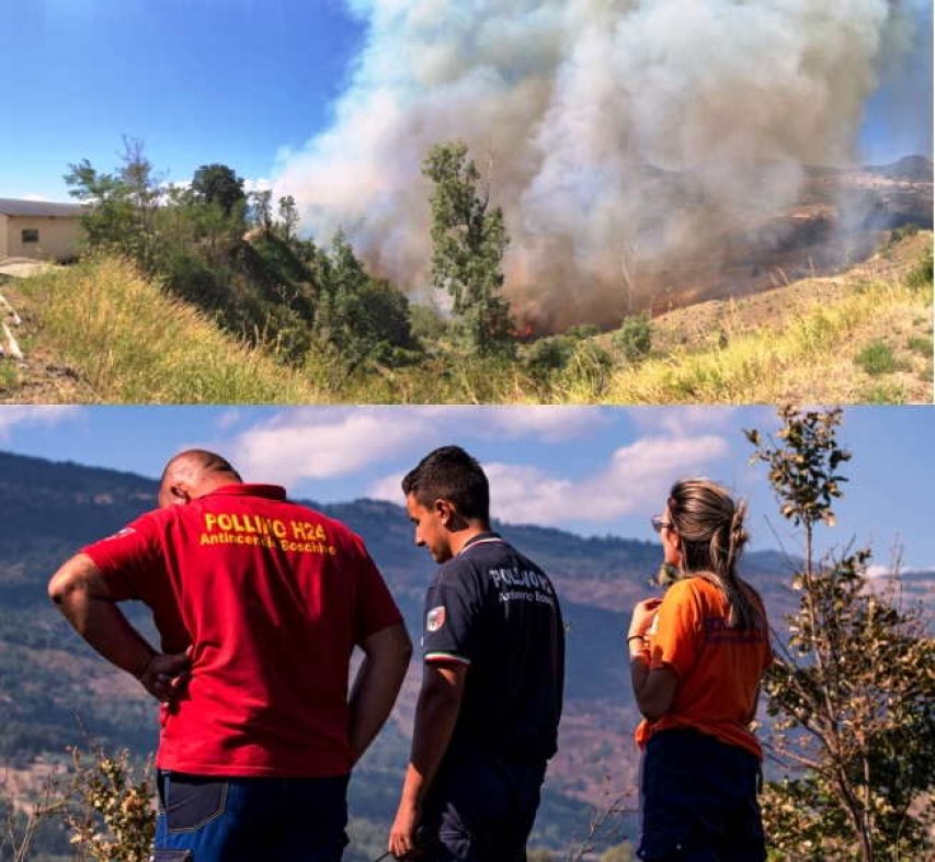 Il fumo sprigionato dall&#039;incendio ed i volontari che indicano il percorso del fuoco